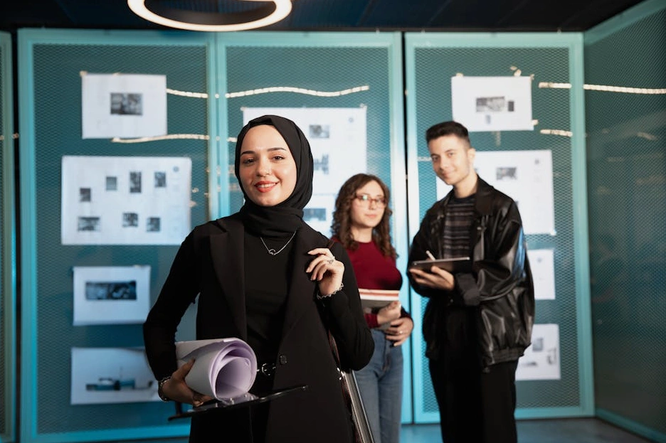 A diverse team of consultants collaborating around a table in a modern office.